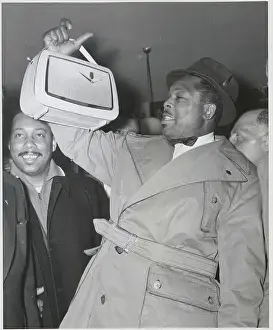 Stuttgart Prints: Archie Moore Holding Radio