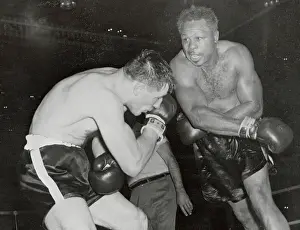 Archie Moore Knocking out Yvon Durelle