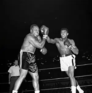 Grimacing Prints: Archie Moore and Muhammad Ali Boxing