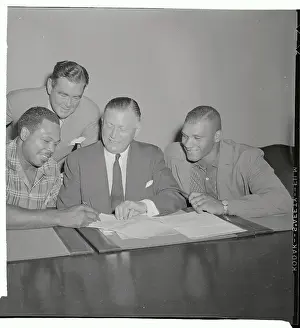 Norris Prints: Archie Moore Signing His Contract