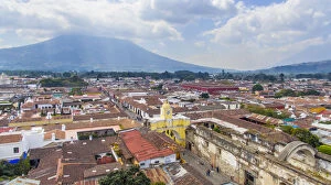 Incidental People Collection: Arco de Santa Catalina (Santa Catalina Arch) and Antigua City in Guatemala, High angle view