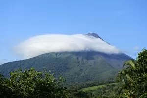 Arenal volcano capped by a cloud, La Fortuna, Costa Rica, South America
