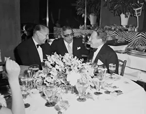 Aristotle Onassis Chatting with Nightclub Guests