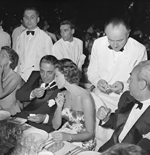 Strapless Prints: Aristotle Onassis Lighting Cigarette for Cyd Charisse