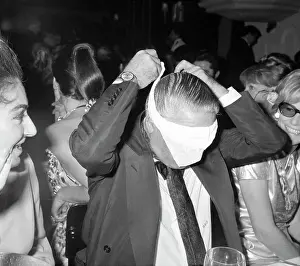 Millionaire Prints: Aristotle Onassis Putting on Blindfold