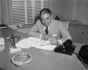 Aristotle Onassis Sitting at His Office Desk
