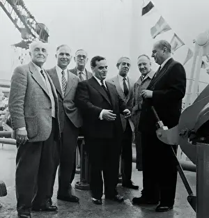 Kiel Prints: Aristotle Onassis Standing With Businessmen