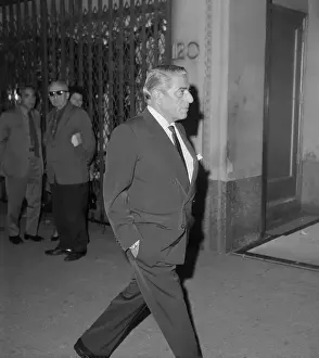Aristotle Onassis Walking With His Hands in Pockets