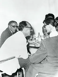 Aristotle and Tina Onassis Sitting in Cafe