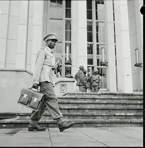 Leopoldville Prints: Armed Congolese Civil Servant Strolling to His Job