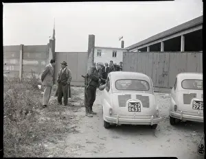 Headquarters Prints: Armed Guard Checking Automobile