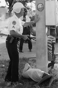 1968 Us Presidential Election Prints: Armed Policeman Hovering over African American Woman