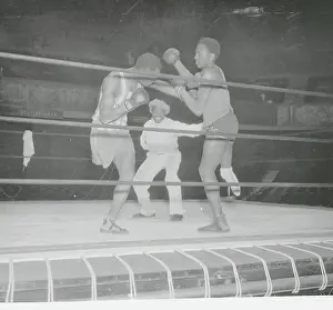 One Armed Referee Between One Legged Boxers