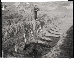 Trench Prints: US Army Chaplain Performs Last Rites Over Mass Grave
