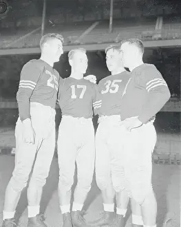 Army Football Players Conversing