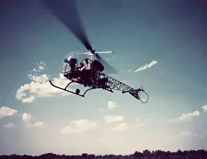 US Army H-13H Helicopter Hovering