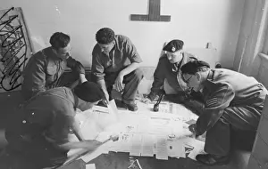 Prints of July 1942: Soldiers making the Turret Newspaper on the floor. Original Publication: Picture Post - 1194 - The Turret Newspaper - unpub Discover the Vision of Haywood Magee – A Master of Mid-Century British Life: Army Journalists