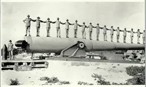 Cannon Prints: Army Members Standing on Cannon