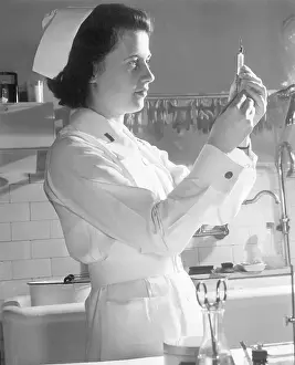 Army Nurse Preparing Injection