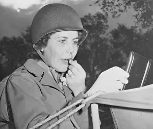 Private Prints: Army Woman Applying Lipstick