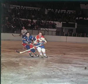 Arnie Brown and Henri Richard Guarding Each Other