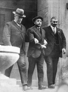 Murderer Prints: Arrest Of Murderer; Police Walking W/Him