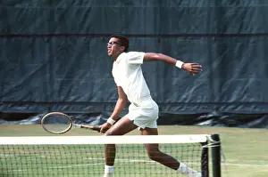 Arthur Ashe Approaching the Ball