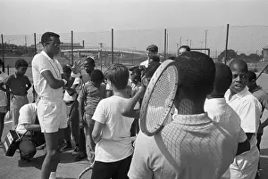 Arthur Ashe Standing with Youngsters