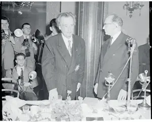 Arthur Honegger Standing Next to a Colleague
