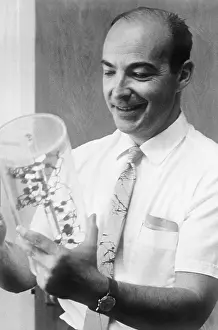 Biochemist Prints: Arthur Kornberg Holding Model