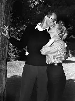 Arthur Miller Kisses Marilyn Monroe