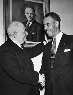 Arthur Spingarn Shaking Hands with Roy Wilkins