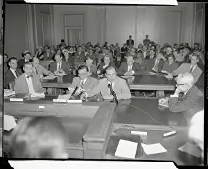 Artie Shaw Sitting at Table in Courtroom