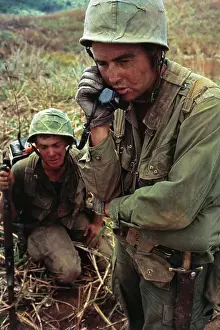 Artilleryman is Seen Keeping Contact by Radio
