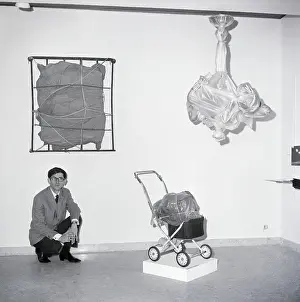 Wrap Prints: Artist Christo With Wrapped Artworks