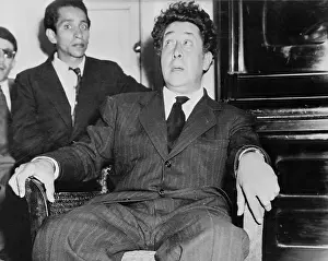 Artist David Alfaro Siqueiros Reclining at Press Meet