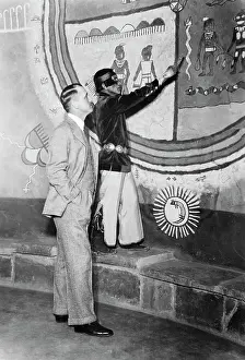 Traditional Style Prints: Artist Explaining Symbolism to Visitor