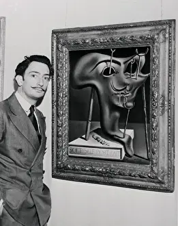 Artist Salvador Dali Standing Next to His Own Portrait