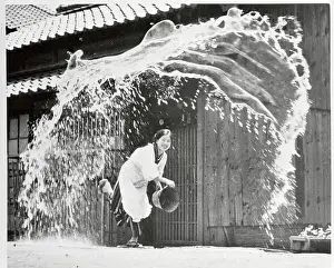 Artist Toji Takashima in her Yard