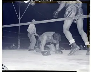 Suffering Prints: Arturo Godoy Struggling on His Knees