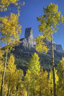 Images Dated 26th September 2016: Aspen trees frame chimney rock formation, San Juan Mountains, Colorado, USA