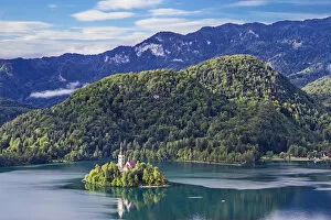 Assumption of Mary Church on an island at Lake Bled, and Julian Alps in background, Gorenjska, Balkan Peninsula