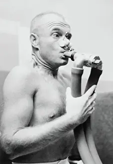 Nasa Prints: Astronaut John Glenn Using Breathing Apparatus