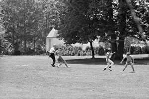 Mclean Prints: Former Astronaut John H. Glenn Playing Touch Football