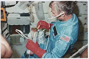 Owen K Prints: Astronaut Owen K. Garriott Working with Medical Specimens