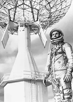 Astronaut Posing Next to Antenna