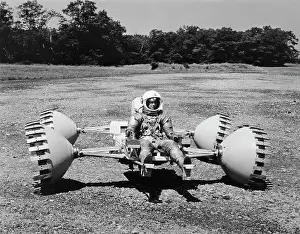 Astronaut Rides on Proposed Lunar Vehicle