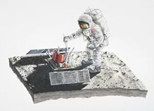 Images Dated 17th May 2006: Astronaut taking a reading from a machine