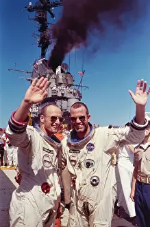 Astronauts Conrad and Cooper Waving