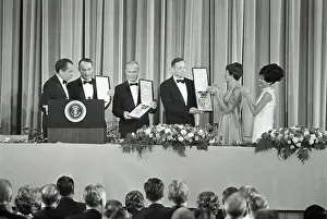 Astronauts Displaying Awards
